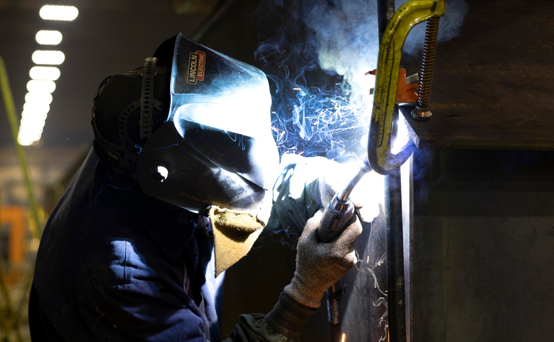 Zenar crane welder working on assembling a crane