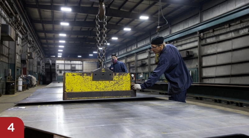 Zenar employees crafting crane parts